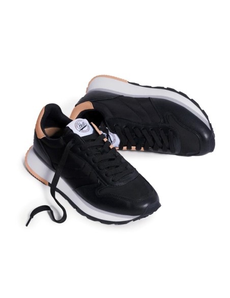 Deportiva de piel combi al tono negro para mujer