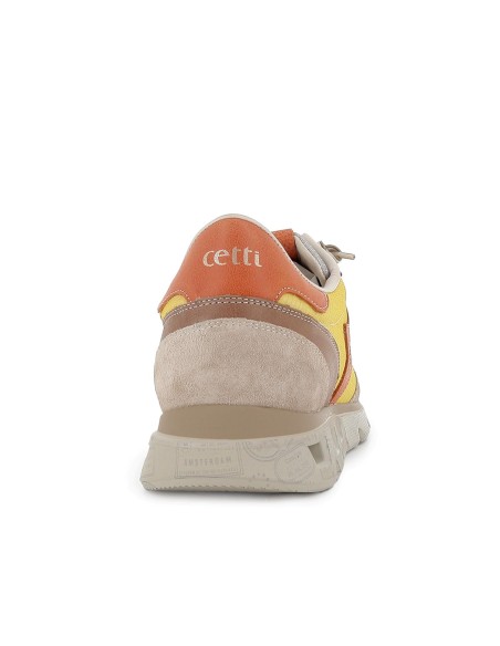 Deportiva acolchada y ante hombre amarillo