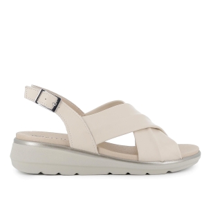 Sandalia piel tiras cruzadas hebilla en talon y cuña mujer beige