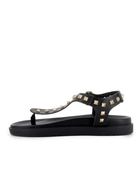 Sandalias esclava piel con tachas decorativas plana mujer negra