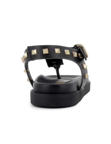 Sandalias esclava piel con tachas decorativas plana mujer negra