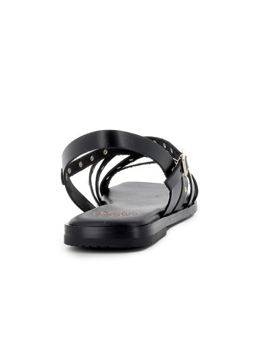 Sandalia piel tiras cruzadas con tachuelas plana mujer negra