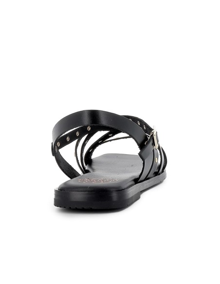 Sandalia piel tiras cruzadas con tachuelas plana mujer negra